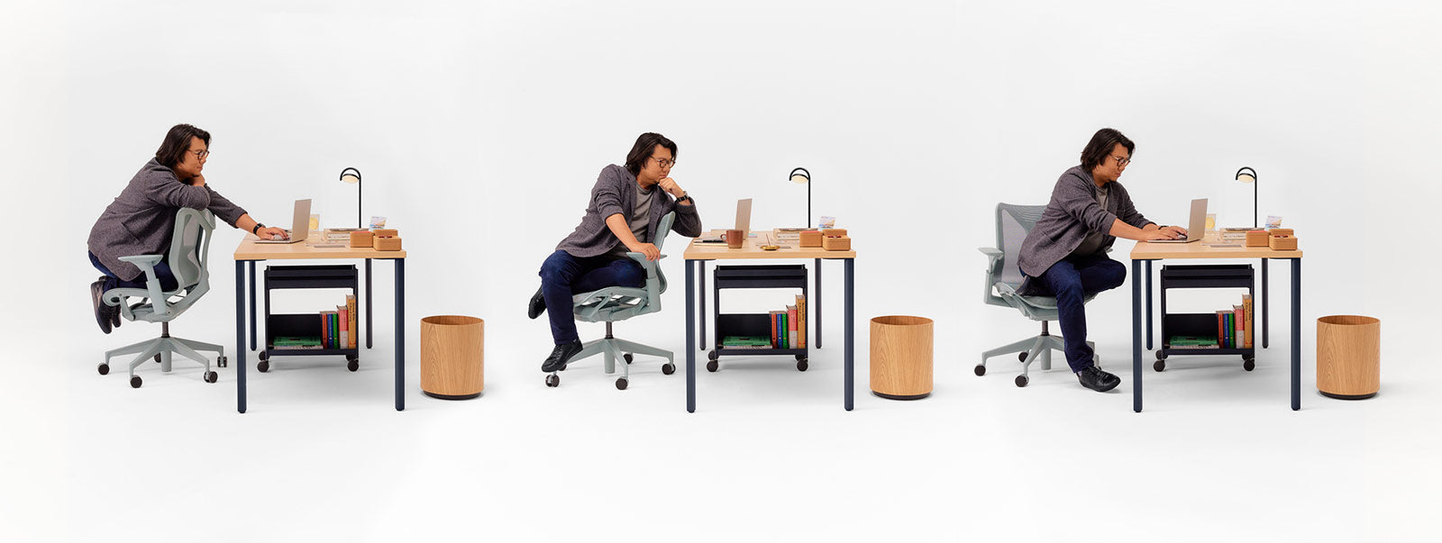 Montage de 3 images de Kevin Kwan assis sur une chaise de bureau Glacier Cosm à dossier bas sous différents angles devant un bureau OE1 à hauteur fixe en bleu nuit et frêne avec un chariot de rangement OE1 en dessous