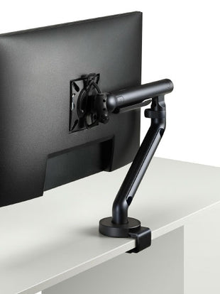 Vue latérale d'un bras de moniteur Flo blanc de CBS, montrant la grande amplitude de mouvement.