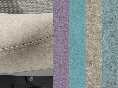 Gros plan sur le tissu Blazer de Camira qui met en valeur la texture et les coutures.