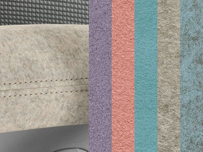 Gros plan sur le tissu Blazer de Camira, qui met en valeur la texture et les coutures.