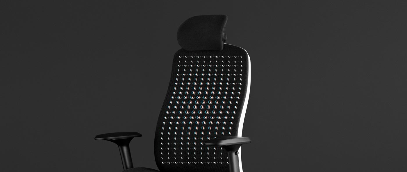 Vue de face d'un fauteuil de jeu Vantum blanc et noir de Herman Miller, superposée à des graphiques blancs mettant en évidence le matériau de suspension.
