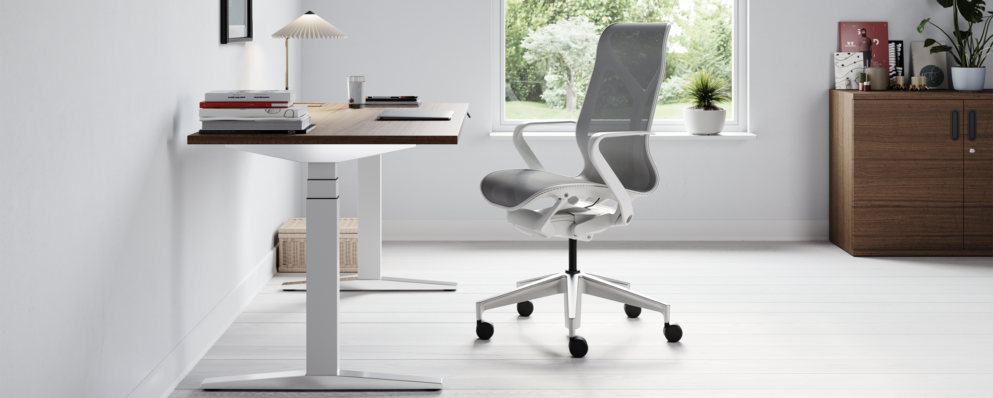 A grey Cosm chair at a Ratio desk